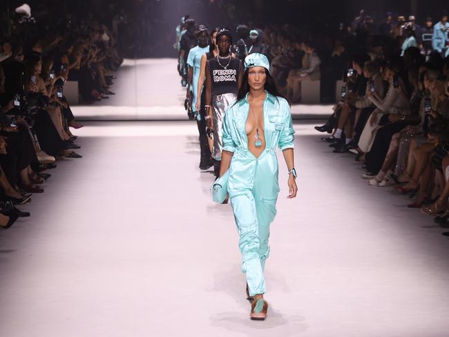 Bella Hadid walks the Fendi runway in a Tiffany blue jumpsuit. Picture: Getty Images