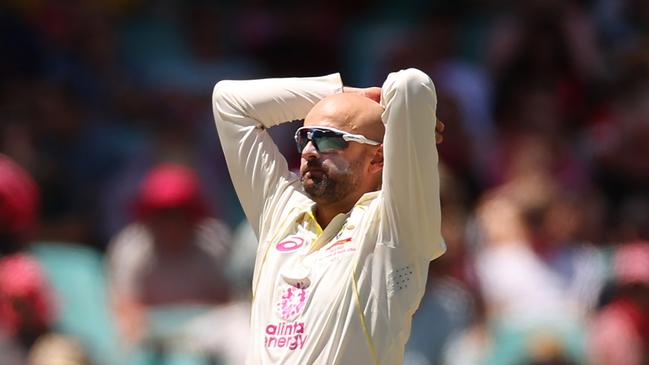 Nathan Lyon reacts during a slow first session for Australia. Picture: Getty