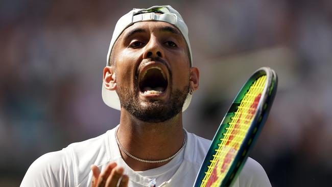 Nick Kyrgios screams in frustration during his Wimbledon final loss to Novak Djokovic. Picture: Getty Images