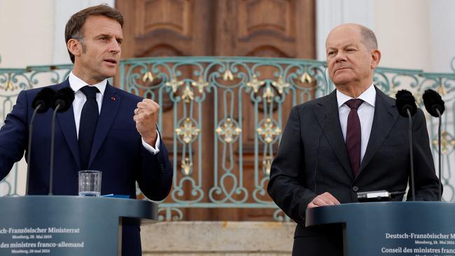 French President Emmanuel Macron, left, and German Chancellor Olaf Scholz at Schloss Meseberg Palace near Berlin. Picture: AFP