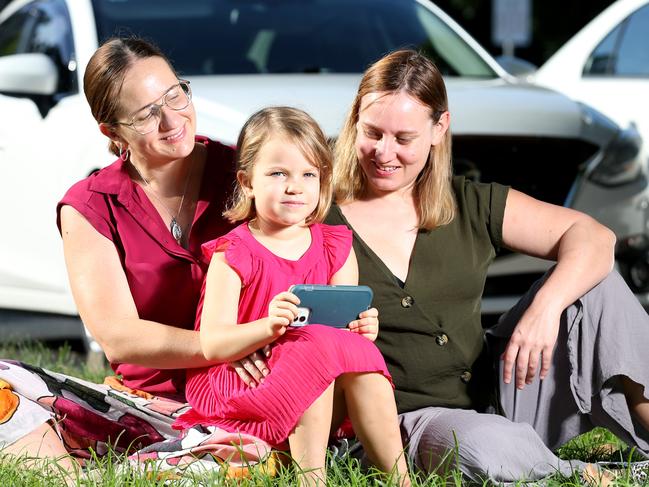 Mums Danielle and Lynsay Westport are bribing their daughter Cleo to stay off social media from age 10-18 when they intend to reward her with a car. Picture: Steve Pohlner