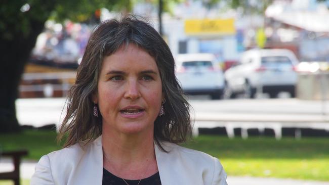 Director of the Australia Institute Tasmania Eloise Carr speaks to the media on Parliament Lawns in Hobart on Thursday, March 10, 2022.