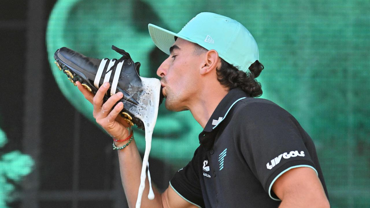 Chile's Joaquin Niemann celebrates victory with a shoey at Grange Golf Club. Picture: Brenton Edwards