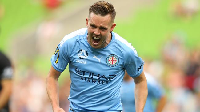 Craig Noone of Melbourne City celebrates after scoring a goal at AAMI Park.