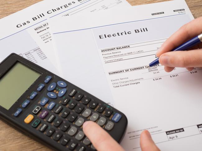 Electric bill charges paper form on the table