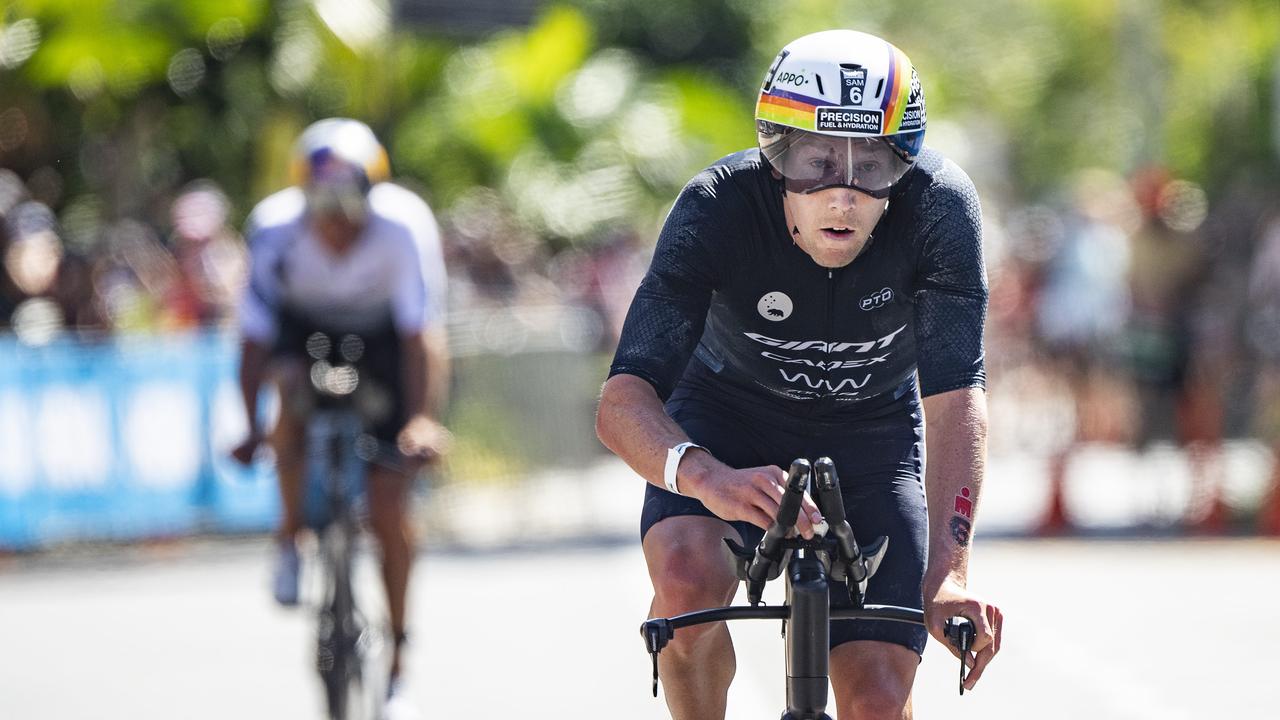 Cairns Iron Man - Sam Appleton (right) leads Braden Currie in second place at the end the bike leg. Picture: Brian Cassey