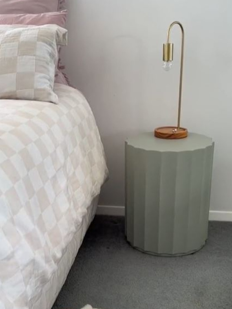 Another popular item from the collection is the scallop side table, which is a sage green. Picture: TikTok