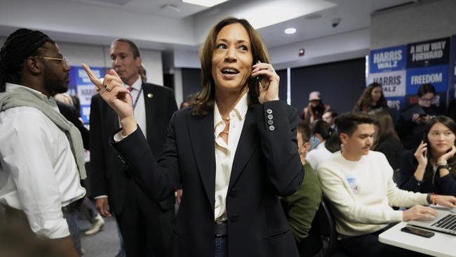 Democratic presidential nominee Vice President Kamala Harris phone banks with volunteers at the DNC headquarters on Election Day.