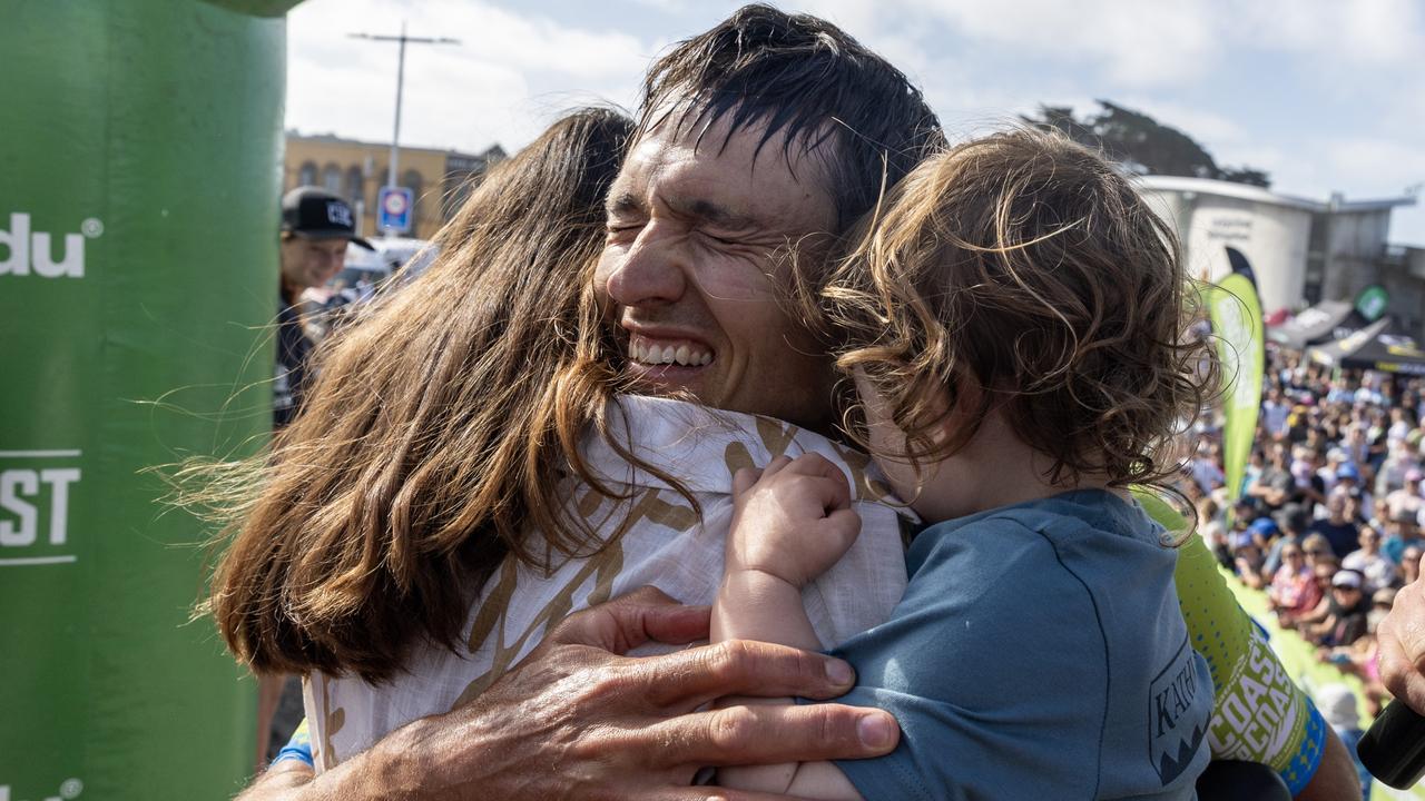 Mr Hunt gets a hug from his happy family. Picture: Iain McGregor/Coast to Coast