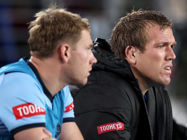 SYDNEY, AUSTRALIA - JUNE 05:  Jake Trbojevic of the Blues looks on from the bench during game one of the 2024 Men's State of Origin Series between New South Wales Blues and Queensland Maroons at Accor Stadium on June 05, 2024 in Sydney, Australia. (Photo by Cameron Spencer/Getty Images)