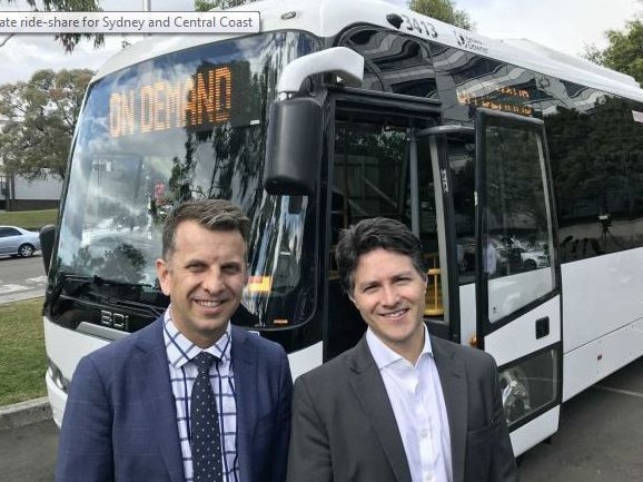 Minister for Transport Andrew Constance and Finance Minister Victor Dominello at the launch of the on-demand bus shuttle service. Picture: ABC