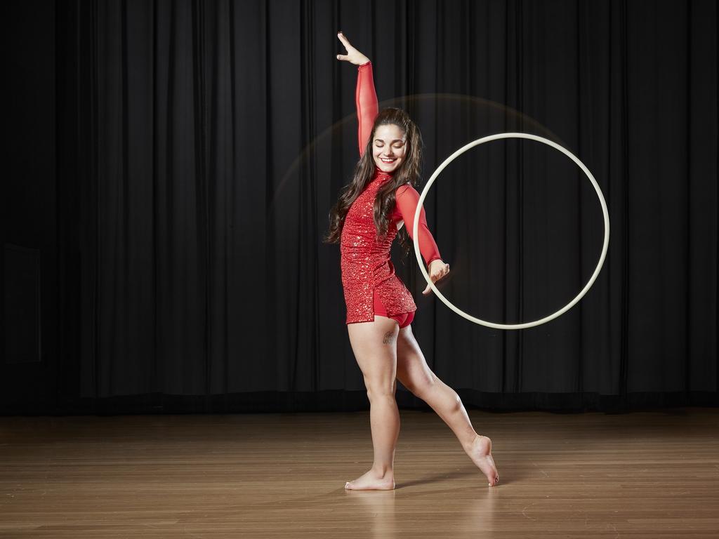 Brookelynn Bley - Most hula hoop rotations on the arm - 1 min. Picture: Kevin Scott Ramos/Guinness World Records