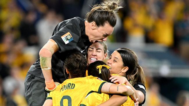 Mackenzie Arnold celebrates with her teammates after Cortnee Vine scored Australia's 10th penalty in the shootout during the FIFA Women's World Cup 2023 quarterfinal match against France in Brisbane. Picture: Bradley Kanaris/Getty Images