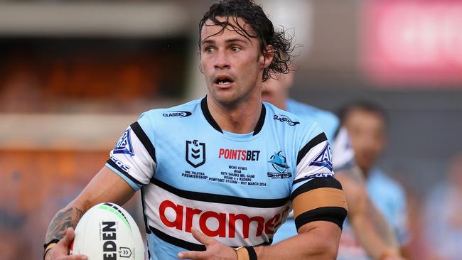 SYDNEY, AUSTRALIA - MARCH 31: Nicho Hynes of the Sharks runs the ball during the round four NRL match between Cronulla Sharks and Canberra Raiders at PointsBet Stadium, on March 31, 2024, in Sydney, Australia. (Photo by Cameron Spencer/Getty Images)