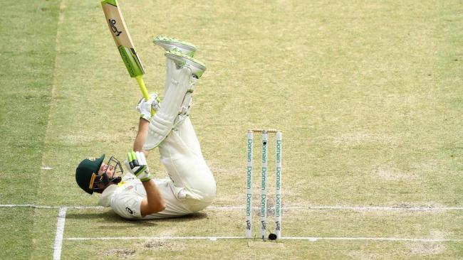 Tim Paine took a tumble during his tough knock. (Photo by Ryan Pierse/Getty Images)