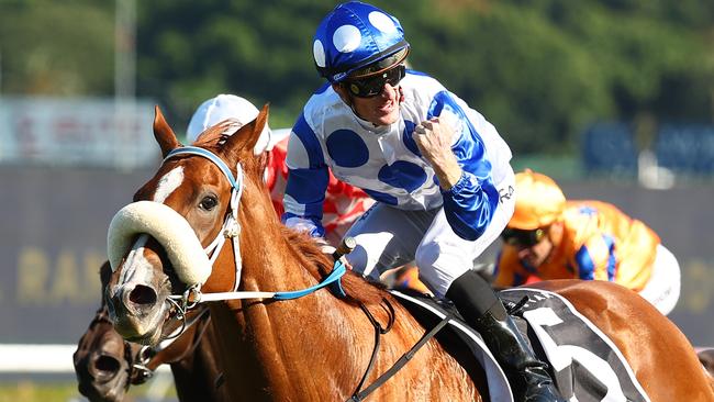 Mark Zahra celebrates after Autumn Angel won the Group 1 Australian Oaks at Randwick on day two of The Championships. Picture: Jeremy Ng/Getty Images