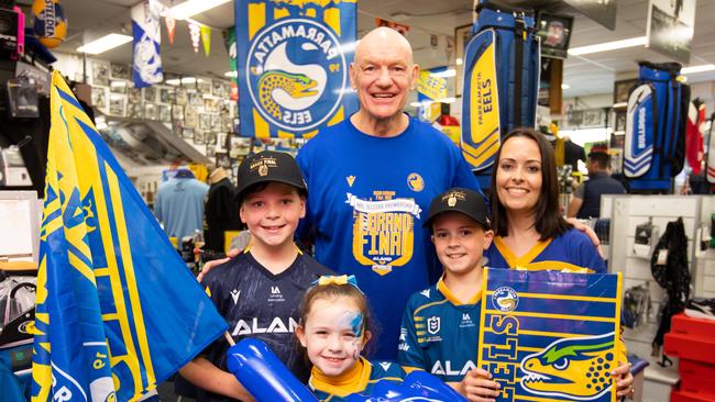 Wynn in his Parramatta store with Eels fans in the lead-up to this weekend’s grand final. Picture: Brendan Read