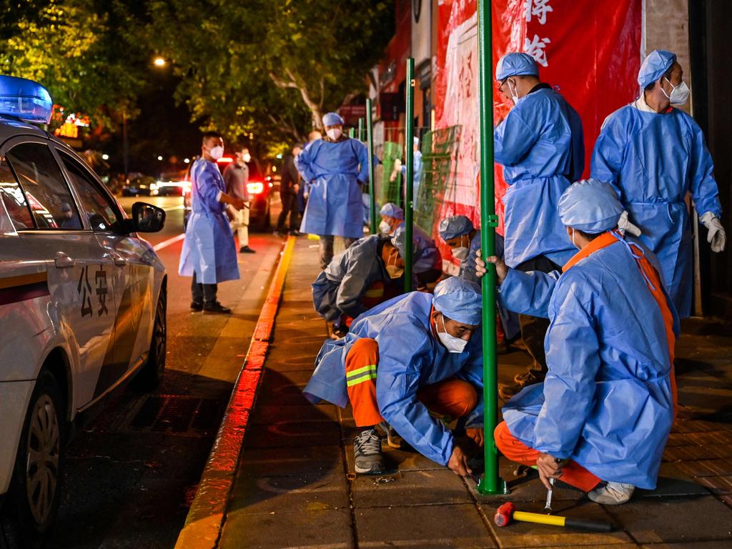 A neighbourhood in Shanghai’s Changning district is fenced in during severe Covid restrictions. Picture: Hector Retamal/AFP