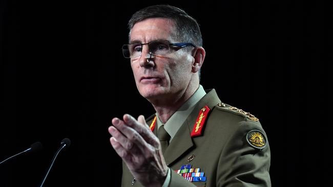 CANBERRA, AUSTRALIA - NOVEMBER 19: Chief of the Australian Defence Force (ADF) General Angus Campbell delivers the findings from the Inspector-General of the Australian Defence Force Afghanistan Inquiry on November 19, 2020 in Canberra, Australia. A landmark report has shed light on alleged war crimes by Australian troops serving in Afghanistan. (Photo by Mick Tsikas - Pool/Getty Images)