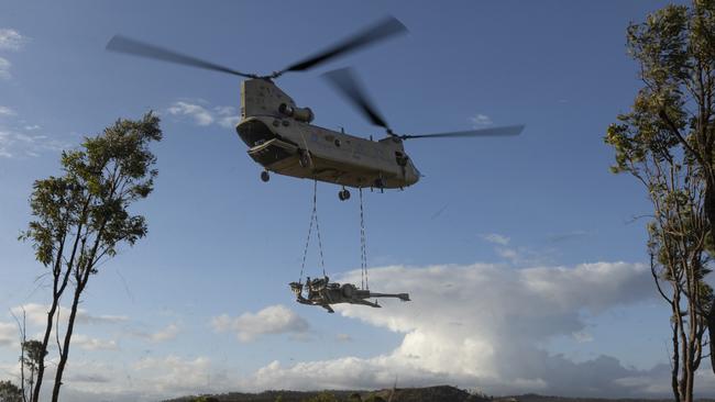 An Australian Army CH-47 Chinook from the 5th Aviation Regiment prepares to unload an M777 howitzer during Exercise Chau Pha near in June. Picture: Defence