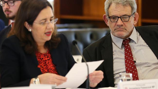 Chief of staff David Barbagallo (right) looks on as Queensland Premier Annastacia Palaszczuk speaks during estimate hearings at Queensland Parliament in Brisbane. (AAP Image/Jono Searle) NO ARCHIVING