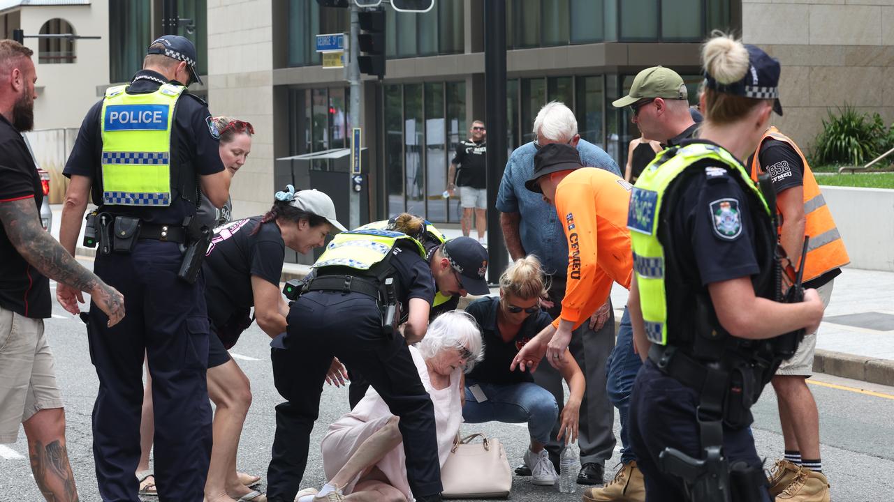 The march was briefly halted at the crossing outside the Treasury Casino as an old woman took a fall crossing the road. Picture: Liam Kidston