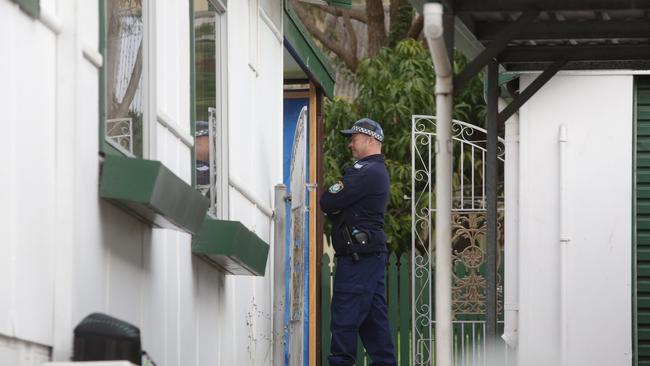 Police have raided a drug house in Dutton St, Bankstown, this morning, next to a primary school Picture: Tim Clapin