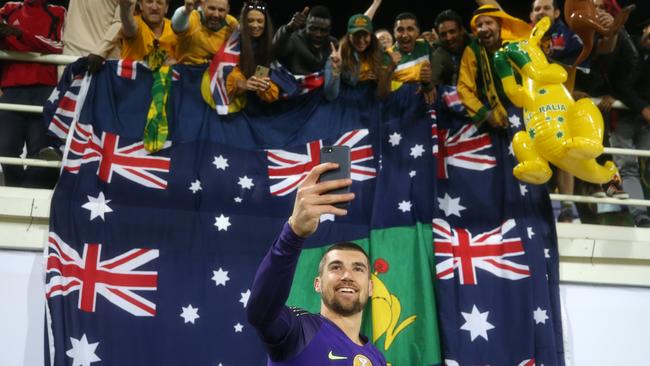 AL AIN, UNITED ARAB EMIRATES - JANUARY 21: Mat Ryan of Australia celebrates with fans following his side's win after a penalty shoot-out in the AFC Asian Cup round of 16 match between Australia and Uzbekistan at Khalifa Bin Zayed Stadium on January 21, 2019 in Al Ain, United Arab Emirates. (Photo by Francois Nel/Getty Images) *** BESTPIX ***