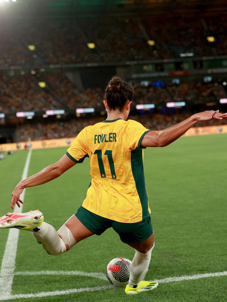 Fowler said the physicality and training in soccer has shaped her as a person. She’s seen kicking a corner during the AFC Women's Olympic Football Tournament Paris 2024 Asian Qualifier Round 3 match between Australia and Uzbekistan at Melbourne’s Marvel Stadium on February 28. Picture: Kelly Defina/Getty Images