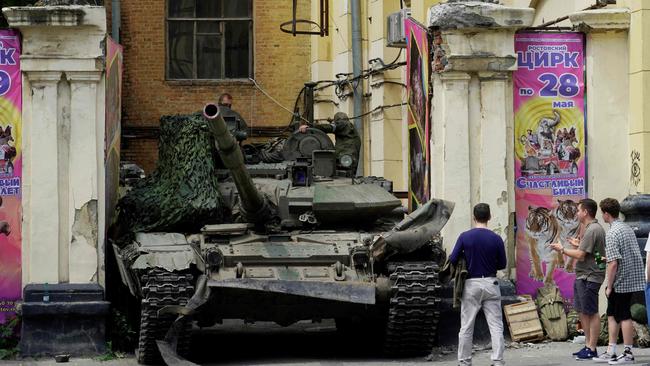 People look at a tank near a circus building in the city of Rostov-on-Don. Picture: AFP