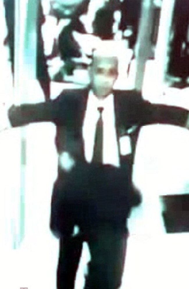 CCTV footage captures Captain Zaharie Ahmad Shah, being frisked while walking through security at Kuala Lumpar International Airport before the ill-fated flight. Picture: Supplied