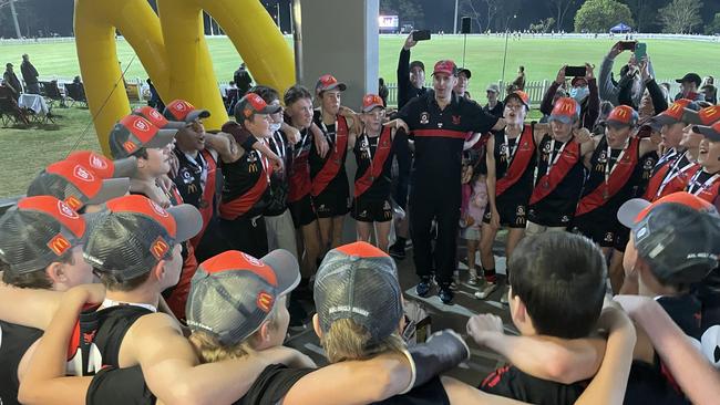 Yeronga singing its victory song after the under 14s win.