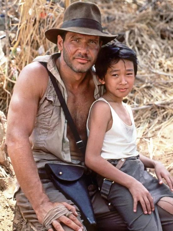 Ford and Jonathan Ke Quan in Indiana Jones And The Temple Of Doom in 1984.