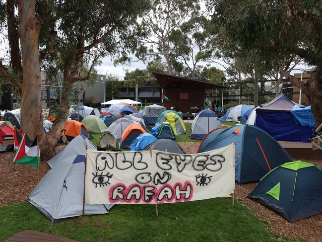 Monash students camped on the Clayton campus’ Lemon Scented Lawns for several weeks last month. Picture: Brendan Beckett