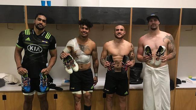 All Blacks star TJ Perenara and his Hurricanes teammates with rainbow shoelaces.