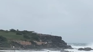 Few braved the water at Clovelly on Friday, as storms continued to lash Sydney. Picture: Henry Porter