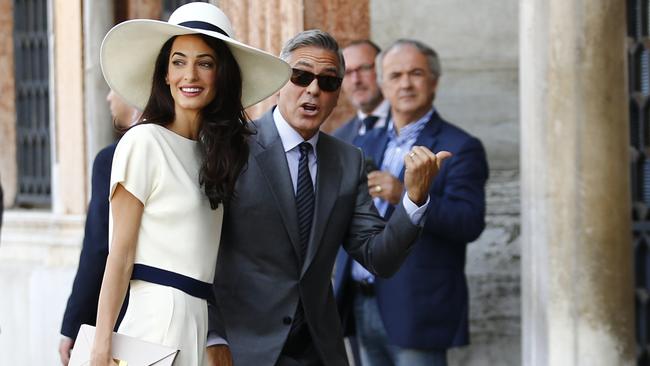 George Clooney and Amal Alamuddin arrive at a Venice office for a civil wedding ceremony. Picture: AFP