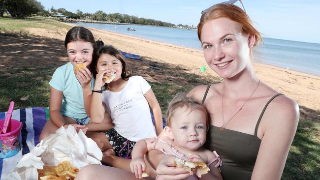 Families will be able to eat fish and chips by the beach again like: Jade White, 23, Clontarf, with her 1 year-old daughter Aurora, and cousins Eden Blackmur, 10, and Milla Blackmur, 8, eating fish and chips at Bells Beach Park, Contarf. Photographer: Liam Kidston.