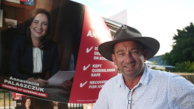 Barron River MP Craig Crawford campaigns late into the afternoon at the Machans Beach State School polling booth. Picture: Brendan Radke