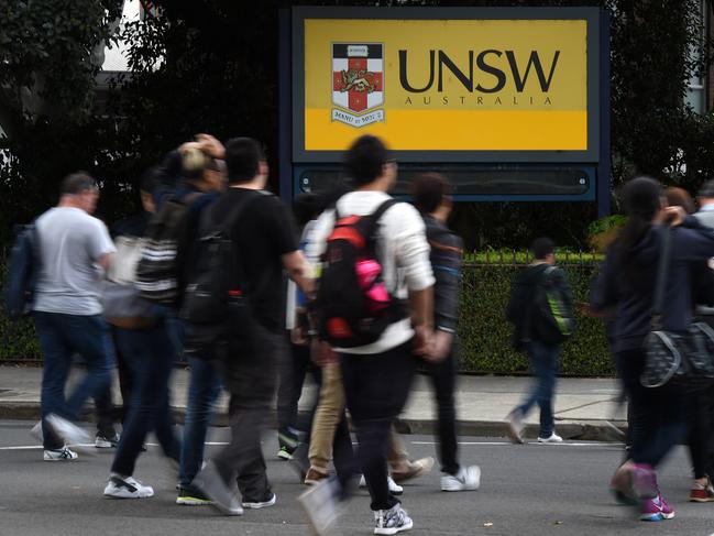 Students enter the University of New South Wales (UNSW) in Sydney on Thursday, Sept. 22, 2016. Australia's universities continue to perform strongly on a global level, with eight universities among the top 200 and 35 of its 43 universities make the list, all within the top 800, but the latest rankings offer a warning about the rise of Asian institutions. (AAP Image/Dean Lewins) NO ARCHIVING