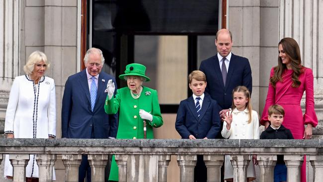 Queen Elizabeth II (3rd L) stands on Buckingham Palace balcony with (From L) Camilla, Duchess of Cornwall, Prince Charles, Prince George, Prince William, Princess Charlotte, Catherine and Prince Louis at the end of the Platinum Pageant in London. Picture: AFP.