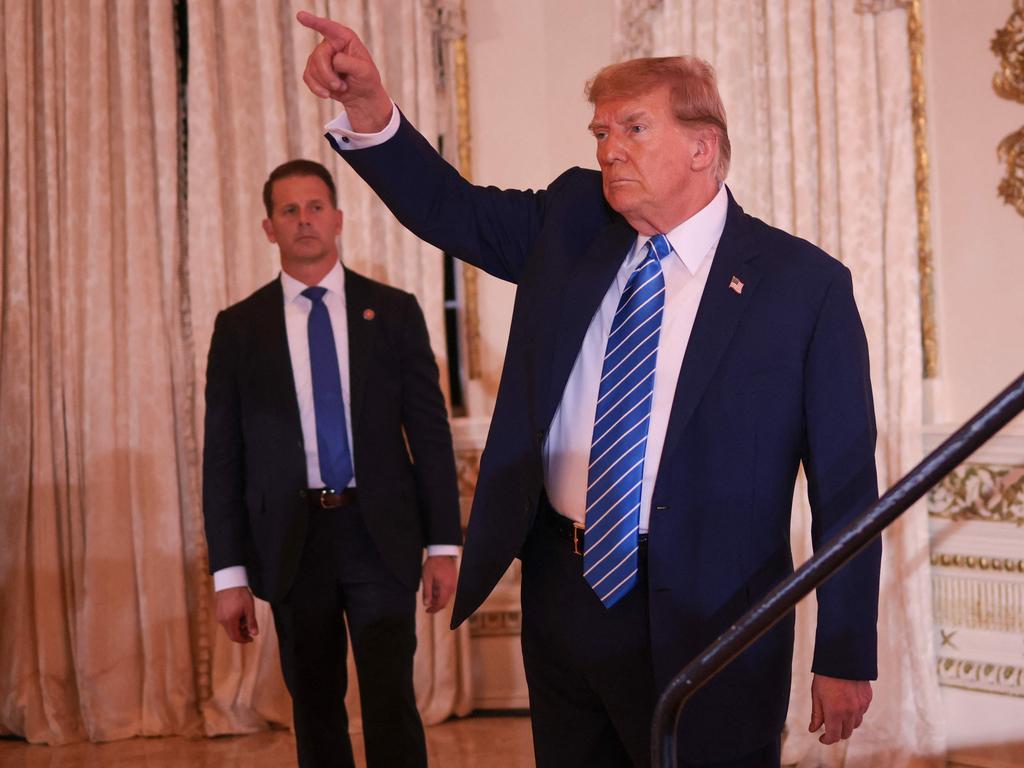 Donald Trump greets supporters at his Super Tuesday victory party. Picture: Win McNamee (AFP)