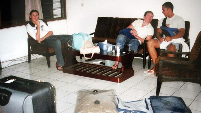 Katrina Richards, Alyth Jeffers (nee McComb) and James Kisina with the seized bag of marijuana in Customs on the night Schapelle Corby was arrested in Denpasar, Bali. Picture: Mercedes Corby.