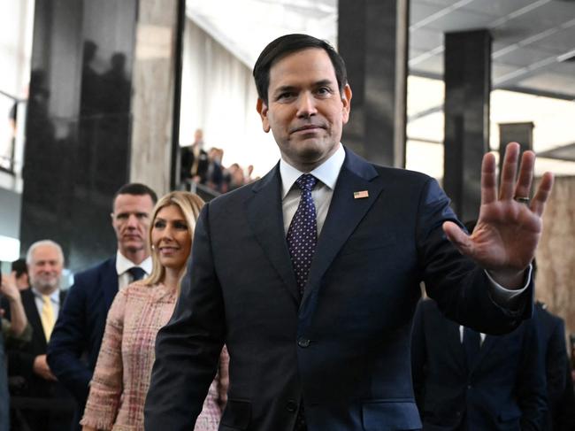 (FILES) US Secretary of State Marco Rubio and his wife Jeanette Rubio arrive to speak to employees upon arrival at the State Department in Washington, DC, on January 21, 2025. Marco Rubio will pay his first trip as US secretary of state to Central American nations including Panama, where President Donald Trump has threatened to seize the Panama Canal, a spokeswoman said January 23, 2025. (Photo by ANDREW CABALLERO-REYNOLDS / AFP)