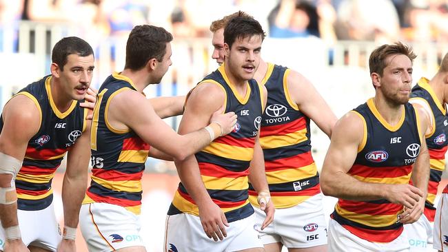 Teammates get around young Crow Darcy Fogarty during his five-goal haul against West Coast. Picture: Paul Kane/Getty Images