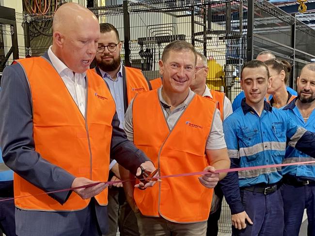 Minister for Defence Peter Dutton and Wide Bay MP Llew O'Brien cut the ribbon at the opening of the Rheinmetall NIOA munitions factory in Maryborough.