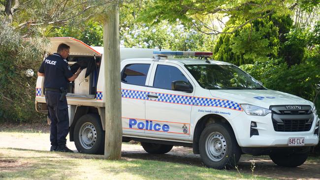 Police at the scene of the incident where a 68-year-old man was attacked with a tomahawk.