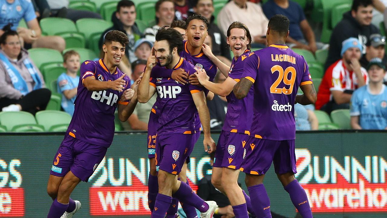 Nick D'Agostino is congratulated by his Perth Glory teammates after scoring against Melbourne City. Picture: Robert Cianflone/Getty Images