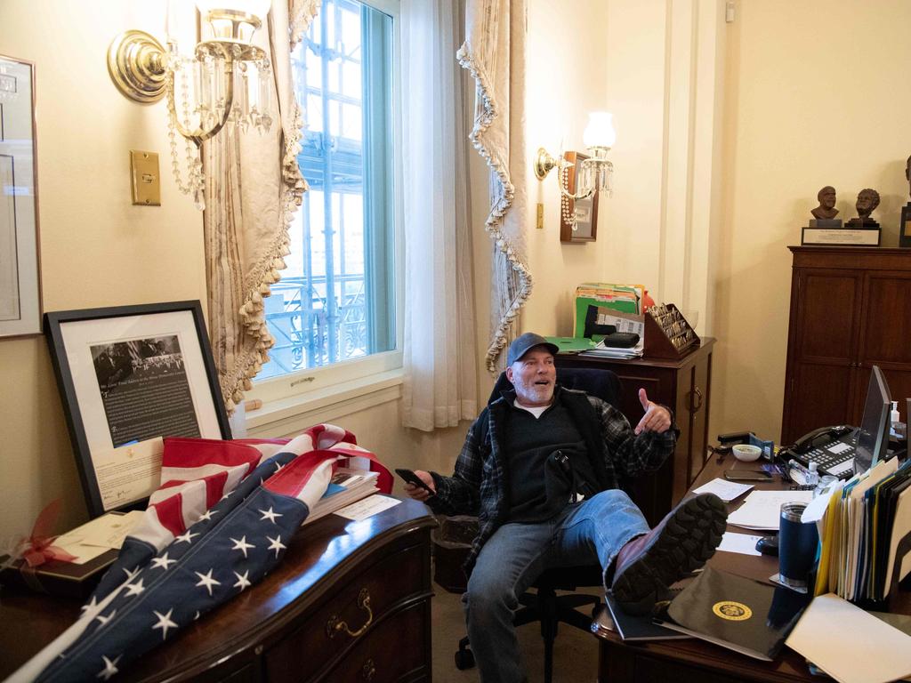 Richard Barnett (pictured) invaded Nancy Pelosi’s office. He has been charged for theft of stationary. Picture: AFP