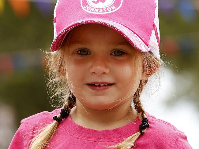 DAILY TELEGRAPH JANUARY 19, 2023. Cadence Szoko, 3, is the niece of signer James Johnston, pictured enjoying the atmosphere as buskers line the streets of the Tamworth Country Music Festival. Picture: Jonathan Ng